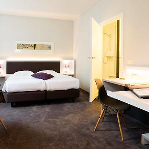 Kamer met een Queen Size Bed